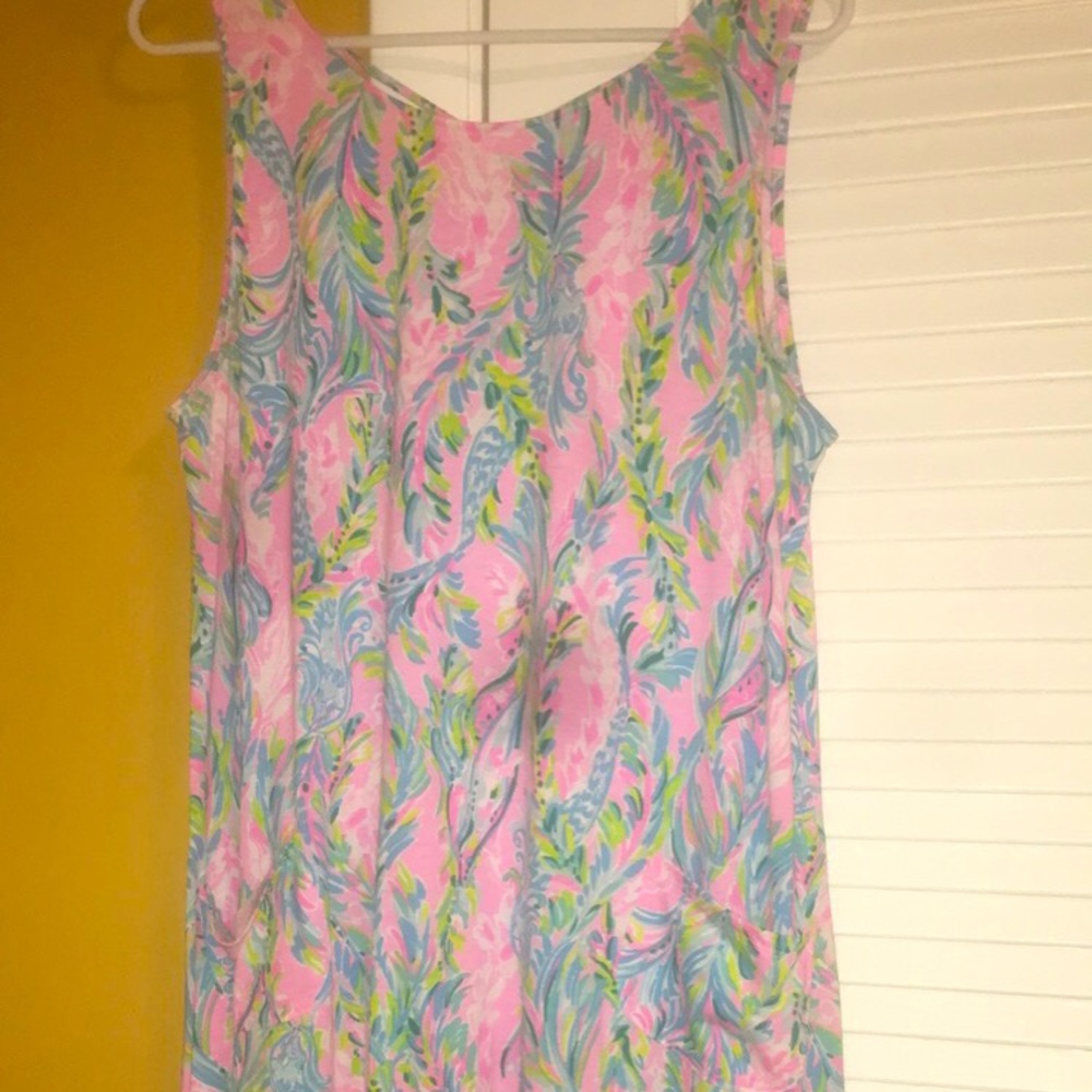 Wore once vibrant colors, dress comes with pockets